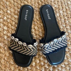 Bamboo Black and Tan Slide Sandals with Shell Accents